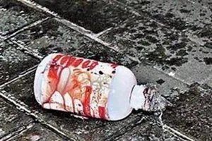 Nghi can ở Biên Hòa chém người, tạt acid vì trái dừa