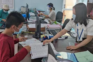 Em Trương Thanh Lộc đã được cấp giấy khai sinh. Ảnh: NGUYỄN HIỀN