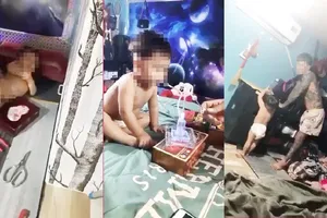 Các đoạn clip lan truyền trên mạng xã hội về việc bé trai bị bạo hành, ép sử dụng ma túy khiến nhiều người bàng hoàng. Ảnh chụp từ clip