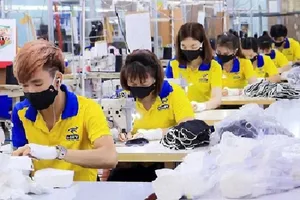 Công ty chỉ được sử dụng lao động làm thêm giờ vào những ngày tết nguyên đán nếu được sự đồng ý của người lao động. Ảnh: NT