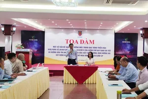 Ông Nguyễn Tấn Cường, Phó Cục trưởng Cục Bổ trợ tư pháp, Bộ Tư Pháp phát biểu tại buổi tọa đàm. Ảnh: NGUYỄN HIỀN