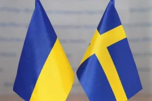 Quốc kỳ Ukraine (trái) và quốc kỳ Thụy Điển (phải). 