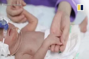 Liu (32 tuổi) đã sinh thành công đứa con trai đầu tiên của mình sau 13 lần sảy thai trong suốt 12 năm qua.