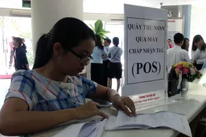 Không phải nộp thuế TNCN trên tiền bồi thường hợp đồng