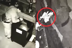 Tên trộm bình tĩnh đứng đếm tiền ngay tại hiện trường