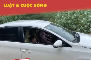 Cấm trẻ ngồi ghế trước ô tô: Đo chiều cao hay kiểm tra tuổi?