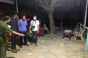 Cơ quan điều tra khám nghiệm hiện trường. Ảnh: DT