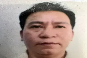 Người dùng thanh kim loại đánh vào mặt bạn 14 năm trước ra đầu thú