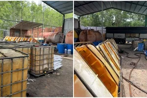 Hàng chục cảnh sát bao vây, thu giữ 28.000 lít nhớt thải tái chế 