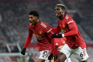 Rashford và Pogba ăn mừng bàn thắng. ẢNH: REUTERS