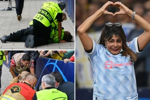 Người phụ nữ may mắn sau cú sút chệch mục tiêu của Ronaldo