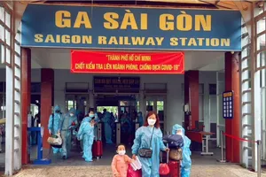 Chùm ảnh: Người dân Quảng Trị lên tàu hỏa về quê từ TP.HCM