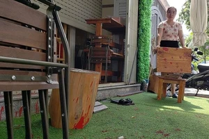 Truy tố người thuê kẻ khác tạt sơn vào quán cà phê ở quận 7