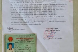 1 nhóm người sử dụng giấy xác nhận giả cơ quan báo chí để đi đường