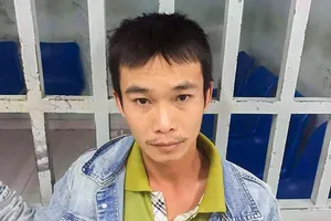 Lê Văn Tiến sau khi bị bắt giữ. Ảnh: AB