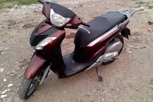 Tráo xe cũ lấy SH ngay trong bãi giữ xe