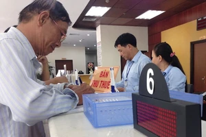 ‘Ép’ chỉ tiêu 90% tiền thuế nộp điện tử