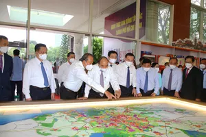 Chủ tịch nước Nguyễn Xuân Phúc chủ trì hội nghị xúc tiến đầu tư vào Hóc Môn - Củ Chi