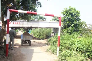 Cầu Mỏ Cày 2 xây thấp, phải 'nạo' nền đường dân sinh
