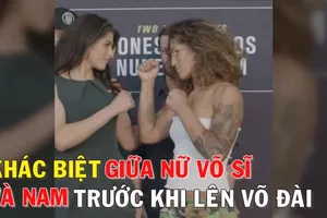 Nữ võ sĩ khoe cơ bắp trước khi thượng đài