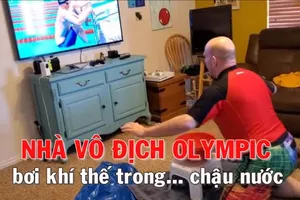 Hai cha con đoạt HCV Olympic nhờ ngụp lặn trong... chậu nước 
