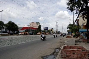 Vụ đường TP.HCM nâng 2 m, phải tìm cách giảm độ cao