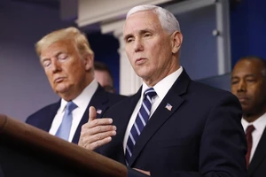 Phó Tổng thống Mỹ Mike Pence phát biểu tại họp ngắn hằng ngày tại Nhà Trắng hôm 21-3. Ảnh: REUTERS