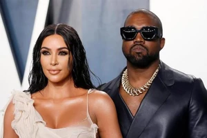Vợ chồng Kanye West và Kim Kardashian - Ảnh: REUTERS