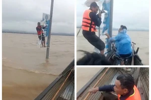 Người đàn ông bị lật thuyền, bám trụ điện suốt đêm chờ cứu hộ