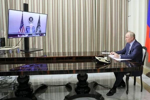 Tổng thống Putin đối thoại trực tuyến với Tổng thống Biden vào năm 2021. Ảnh: Mikhail Metzel/POOL/TASS