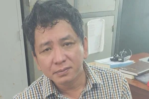 Nguyên giám đốc công ty đo đạc bị truy nã đặc biệt ra đầu thú