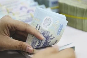 Áp lực lên mặt bằng lãi suất còn lớn