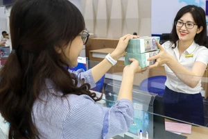 Ngân hàng nào được hưởng lợi từ Thông tư 26 của NHNN?