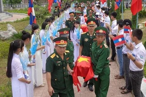 Truy điệu, an táng 54 hài cốt liệt sĩ hy sinh trên đất Lào 