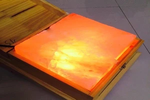 Xém mất hai bàn chân vì sưởi đèn đá muối