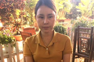 Bắt quả tang 1 phụ nữ nhận 115 triệu đồng để chạy án