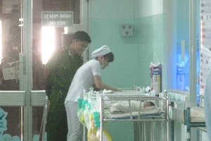 Nghi can đem trả lại bé sơ sinh bị bắt cóc tại BV Hùng Vương