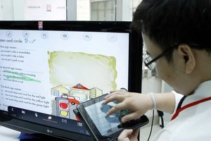 TTXVN: Cân nhắc việc sử dụng máy tính bảng cho học sinh tiểu học