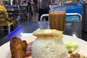 Từ đĩa cơm gà 4 năm không tăng giá đến kiểm soát lạm phát