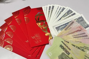 Nhận lì xì Tết từ công ty có phải đóng thuế thu nhập cá nhân?