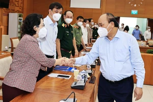 Chủ tịch nước Nguyễn Xuân Phúc tại buổi làm việc với lãnh đạo TP.HCM về công tác phòng chống dịch COVID-19 trên địa bàn.