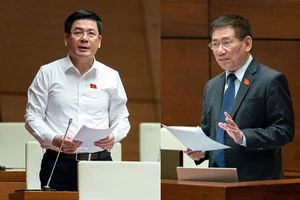Trong khi Bộ trưởng Bộ Công Thương Nguyễn Hồng Diên (trái) lý giải nguyên nhân các cửa hàng tạm nghỉ vì thiếu xăng dầu thì Bộ trưởng Bộ Tài chính Hồ Đức Phớc đề nghị chuyển luôn giá xăng dầu cho Bộ Công Thương quyết.