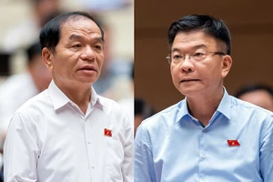 Đại biểu Quốc hội Lê Thanh Vân (trái) và Bộ trưởng Bộ Tư pháp Lê Thành Long tại phiên thảo luận.