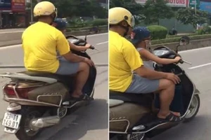 Công an làm việc với người cha cho con 6 tuổi lái xe máy