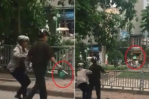 Tự quản phường ném cân người bán hàng rong xuống sông