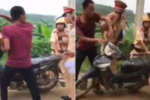 CSGT lên tiếng vụ 'dắt xe máy cũng bị xử phạt'