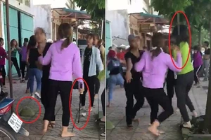 2 nhóm thiếu nữ cầm mũ cối, gậy sắt đánh nhau túi bụi
