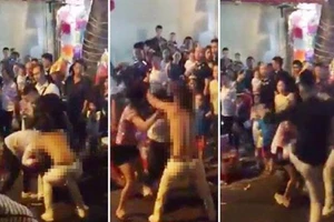 Cô gái trẻ bị lột đồ giữa đám đông 