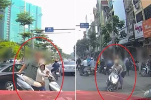 Nghe điện thoại giữa phố, người phụ nữ bị ông Tây 'xử'