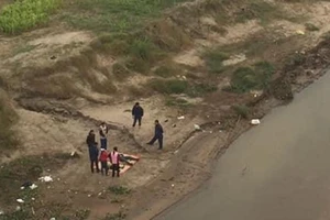 Phát hiện thi thể 2 cha con dưới sông